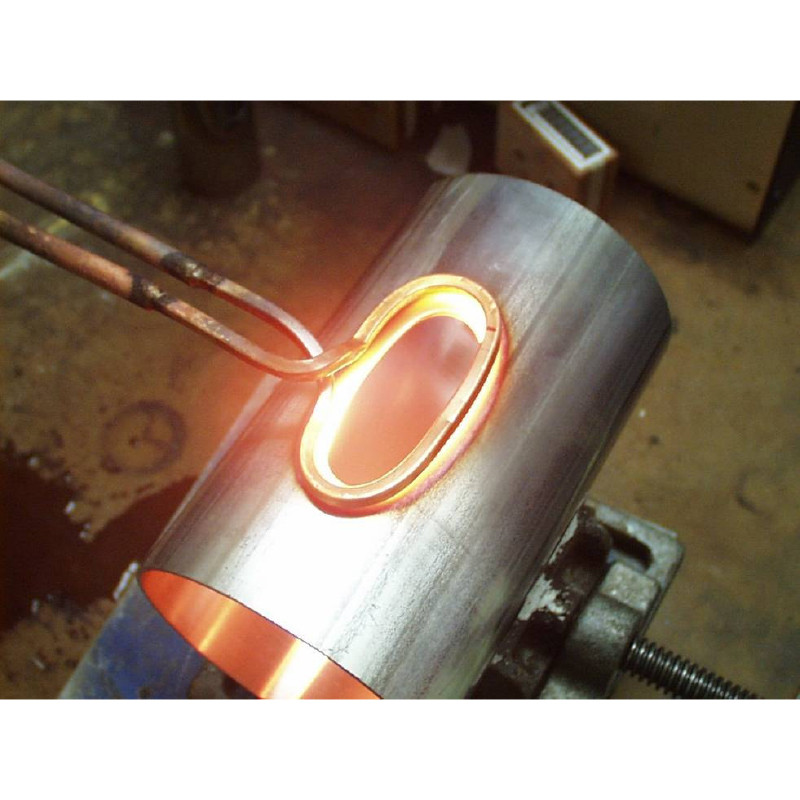 Anneal an oval cut out on a stainless steel tube prior to extrusion