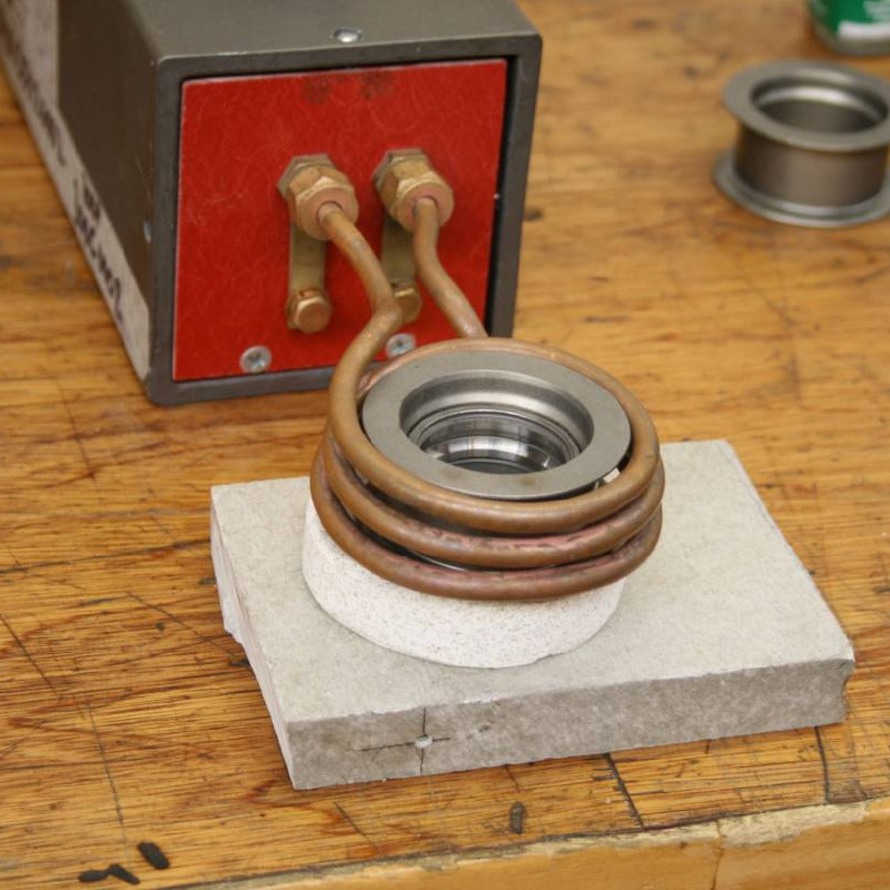 Shrink fitting aluminum pulley to insert inner bearing